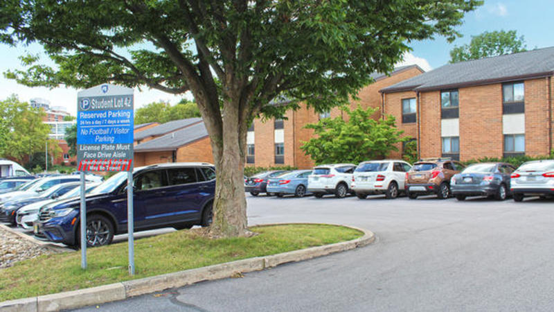 Student parking lot by Nittany Apartments