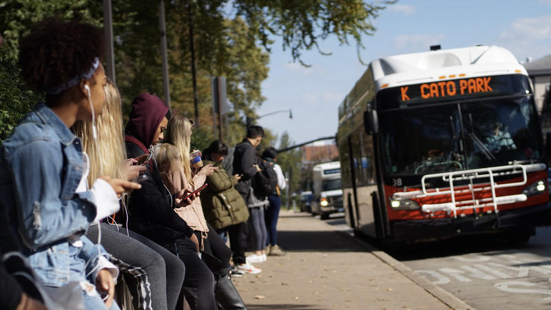 People waiting for a CATA bus