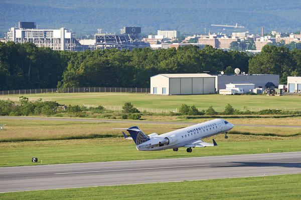 Plane taking off from the University Park Airport