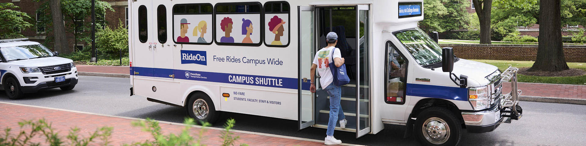 Rider getting on the Campus Shuttle